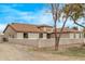 Charming single-story home with a neutral color palette and beautiful desert landscaping at 21520 W Watkins St, Buckeye, AZ 85326