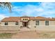 Charming single-story home featuring a welcoming entrance and well-maintained exterior at 21520 W Watkins St, Buckeye, AZ 85326