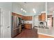 Spacious kitchen featuring stainless steel appliances and wood cabinets at 21520 W Watkins St, Buckeye, AZ 85326