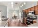 Bright kitchen with stainless steel appliances and adjacent dining area at 21520 W Watkins St, Buckeye, AZ 85326