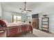 Bedroom with a ceiling fan, carpet flooring, and a dresser at 21520 W Watkins St, Buckeye, AZ 85326