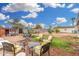 Spacious backyard featuring a cozy seating area and potential for outdoor enjoyment with a patio and comfortable seating at 2230 N 14Th Pl, Phoenix, AZ 85006