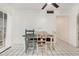 Charming dining area featuring bright, white walls and a unique assortment of chairs at 2230 N 14Th Pl, Phoenix, AZ 85006