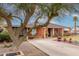 Well-kept single-story brick home with a long driveway and mature landscaping at 2230 N 14Th Pl, Phoenix, AZ 85006