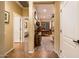 The hallway displays tile flooring, access to all areas of the home, and a neutral color palette at 23236 N Caleta Ct, Sun City West, AZ 85375