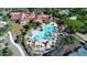 Overhead aerial shot of community pool with splash pad and palm trees at 26578 W Piute Ave, Buckeye, AZ 85396