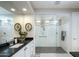 Contemporary bathroom design with a walk-in shower featuring sleek fixtures and tile work at 26578 W Piute Ave, Buckeye, AZ 85396