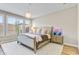 Serene bedroom features a plush rug, decorative chandelier, and ample natural light through shuttered windows at 29304 N Horton Creek Trl, Rio Verde, AZ 85263