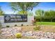 Sign for Verde River Golf & Social Club in front of a well-manicured golf course and desert landscape at 29304 N Horton Creek Trl, Rio Verde, AZ 85263