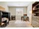 Cozy office space featuring a floral chair, rug, and neutral colors at 29304 N Horton Creek Trl, Rio Verde, AZ 85263