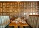 Dining room with a wine display and set table with padded seating at 29304 N Horton Creek Trl, Rio Verde, AZ 85263