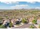 Wonderful aerial view of the community showcases desert surroundings, mountainous scenery, and neighborhood streets at 30480 N 128Th Ln, Peoria, AZ 85383