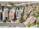 Aerial view of the neighborhood highlighting the houses, pools, landscaping, and street layout at 30480 N 128Th Ln, Peoria, AZ 85383