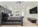 Spacious main bedroom with a ceiling fan and view to the outside patio at 315 W Sonoma Dr, Litchfield Park, AZ 85340