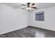 Bright bedroom with a ceiling fan and a window for natural light at 342 E Backman St, San Tan Valley, AZ 85140