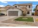 Charming two-story home featuring a low maintenance yard with a large driveway at 342 E Backman St, San Tan Valley, AZ 85140