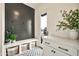 Mudroom with bench, storage, and accent wall at 3964 E Penedes Dr, Gilbert, AZ 85298