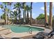 Private pool with lush landscaping and chaise lounges is perfect for relaxing and enjoying the sunny weather at 402 E Muriel Dr, Phoenix, AZ 85022