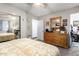 Bedroom with a carpeted floor, ceiling fan, and adjacent closet at 4202 N 74Th Dr, Phoenix, AZ 85033