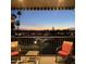 Charming balcony with seating offering lovely sunset views in the distance, perfect for relaxation at 425 S Parkcrest -- # 323, Mesa, AZ 85206