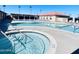 Exterior shot of a community pool with hot tub and lots of lounge chairs at 425 S Parkcrest -- # 323, Mesa, AZ 85206