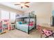 Cozy bedroom with bunk beds and a ceiling fan at 4365 E Anderson Dr, Phoenix, AZ 85032