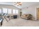 Bonus room featuring a neutral color palette with a cozy couch and carpet flooring at 4365 E Anderson Dr, Phoenix, AZ 85032