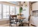 Sunlit breakfast nook with a round table and large windows at 4365 E Anderson Dr, Phoenix, AZ 85032