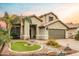 Inviting home exterior features desert landscaping and a neutral color palette at 4365 E Anderson Dr, Phoenix, AZ 85032