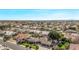 Expansive aerial view of a residential community with diverse homes, streets and well-maintained landscaping at 4503 E Elmwood St, Mesa, AZ 85205