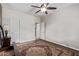 Cozy bedroom with patterned rug and plenty of natural light at 4503 E Elmwood St, Mesa, AZ 85205