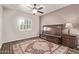 Inviting bedroom with dark wood furniture and decorative rug at 4503 E Elmwood St, Mesa, AZ 85205