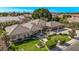 Beautiful aerial shot of a single-Gathering home with mature landscaping, shade trees, and a three car garage at 4503 E Elmwood St, Mesa, AZ 85205