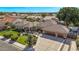 Beautiful single-Gathering home aerial view showcasing lush landscaping, mature trees and a three car garage at 4503 E Elmwood St, Mesa, AZ 85205