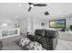 Spacious living room featuring neutral tones, comfortable seating, and a view of the home's interior at 4602 E Oberlin Way, Cave Creek, AZ 85331