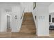 Bright staircase with wood treads, white risers, and modern railing at 4602 E Oberlin Way, Cave Creek, AZ 85331