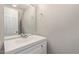 Bathroom featuring a white vanity, mirror, and modern fixtures at 4703 N 26Th Ln, Phoenix, AZ 85017