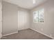 A bedroom with carpet flooring and a closet for storage at 4703 N 26Th Ln, Phoenix, AZ 85017