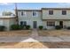 Charming two-story townhouse with neatly landscaped front yard and inviting entrance at 4703 N 26Th Ln, Phoenix, AZ 85017