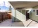 View of the backyard patio with a shed, creating a functional and private outdoor space at 4703 N 26Th Ln, Phoenix, AZ 85017