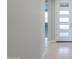 Bright foyer with tiled floors and modern front door, offering a glimpse into the home's interior at 5091 N Bryce Canyon Dr, Eloy, AZ 85131