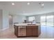 Kitchen island featuring stainless steel dishwasher and views of the open-concept living space at 5091 N Bryce Canyon Dr, Eloy, AZ 85131