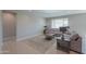 Cozy living room with neutral tones, area rug and natural light, a relaxing retreat at 5091 N Bryce Canyon Dr, Eloy, AZ 85131