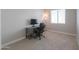 Room with desk, office chair and window at 5091 N Bryce Canyon Dr, Eloy, AZ 85131