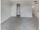 Neutral bedroom featuring a closet and open entry to bathroom at 5432 E Juniper Ave, Scottsdale, AZ 85254