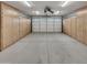 Garage with bright overhead lighting and built-in storage cabinets to maximize space and organization at 5432 E Juniper Ave, Scottsdale, AZ 85254