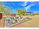 Cozy fire pit area surrounded by Adirondack chairs, ideal for relaxing and enjoying the outdoor ambiance at 6611 E Peak View Rd, Cave Creek, AZ 85331