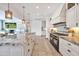 Spacious kitchen featuring an island, stainless steel appliances, and a seamless transition to the living area at 6611 E Peak View Rd, Cave Creek, AZ 85331