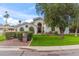 Charming single-Gathering home with a well-manicured lawn and beautiful desert landscaping at 6801 N 1St Pl, Phoenix, AZ 85012