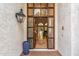 Elegant front door with glass panels, offering a glimpse into the home's open layout at 6801 N 1St Pl, Phoenix, AZ 85012